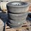 #6104-•-set-of-(4)-trailer-tires-on-8-bolt-rims-image-1