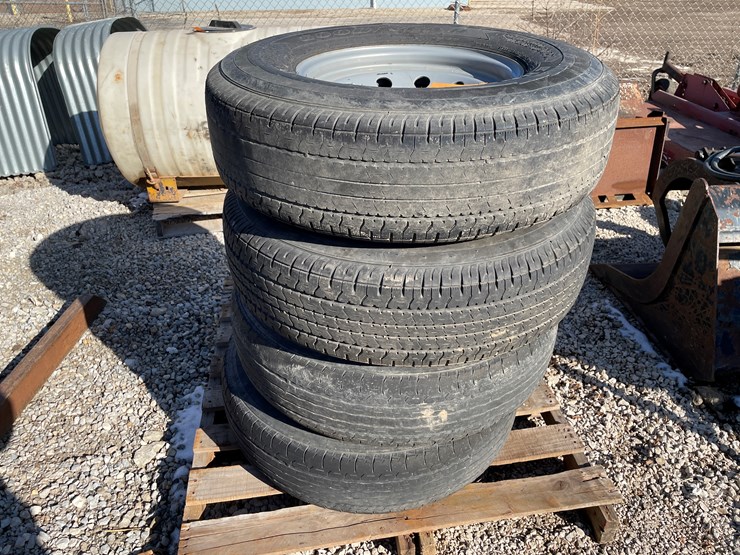 #6104-•-set-of-(4)-trailer-tires-on-8-bolt-rims-image-1