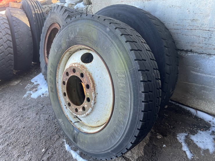 #6027-•-(2)-semi-truck-tires-on-10-bolt-rims-image-1