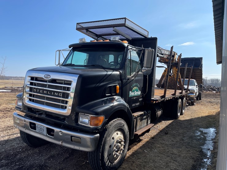 #1005-•-2003-sterling-log-truck-(has-wi-title)-(grantsburg,-wi)-image-1