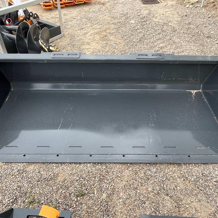 #4328 • Unused 2026 Wolverine Skid Steer Track Duty Bucket Attachments