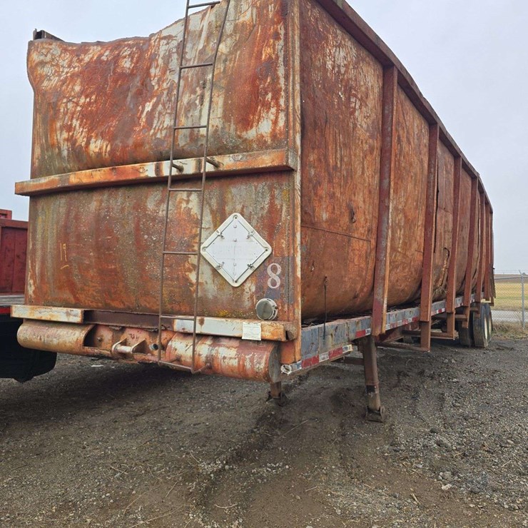 Tall Sided Semi Trailer with steel floor, tandem axle, 8ft sides, 42ft long, steel floor, tires are off the bead, rear end swinging gate