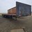 48ft-flatbed-semi-trailer,-tandem-axle,-wood-floor,-tie-downs,-spare-tire,-side-toolboxes,-spring-ride,-11r22.5,-image-3