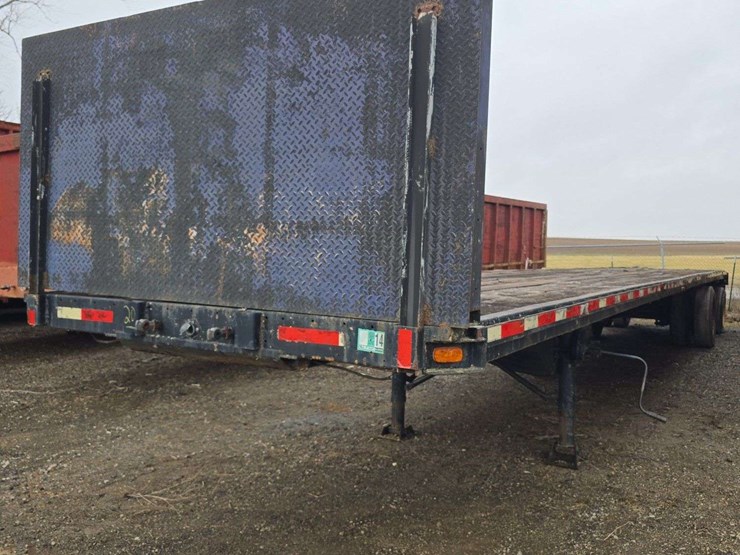 48ft-flatbed-semi-trailer,-tandem-axle,-wood-floor,-tie-downs,-spare-tire,-side-toolboxes,-spring-ride,-11r22.5,-image-1