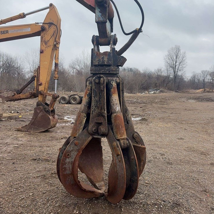 Young HD Rotating Hyd. 4 Tine Claw Grapple, 1 owner, rotating hyd. hook is not hooked up, (If a bid is placed on either Lot 4 Link Belt Excavator or Lot 5 the Young Grapple with less than 2 minutes left, both items extend by 2 minutes. They sell separately and are separate lots!)