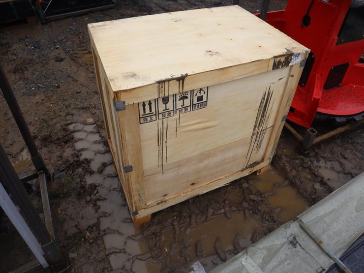 tpm-crate-of-mini-excavator-attach.-image-1