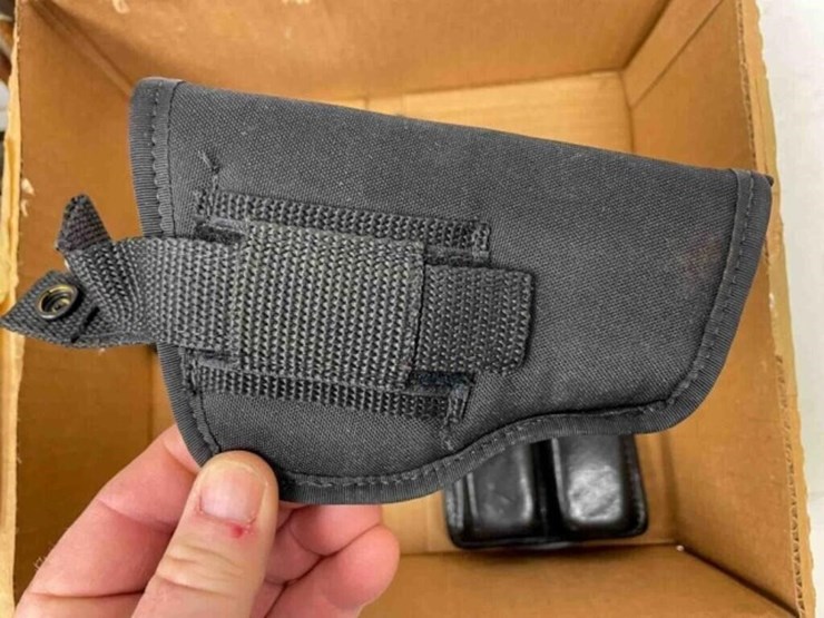 box-of-holsters,-misc.-magazines-image-3