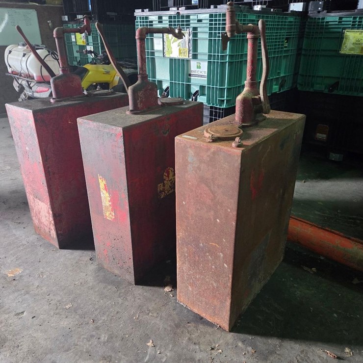 (3) oil barrels w/ hand pumps