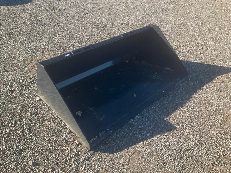 #1169-•-unused-wolverine-skid-steer-track-duty-bucket-attachment-image-1