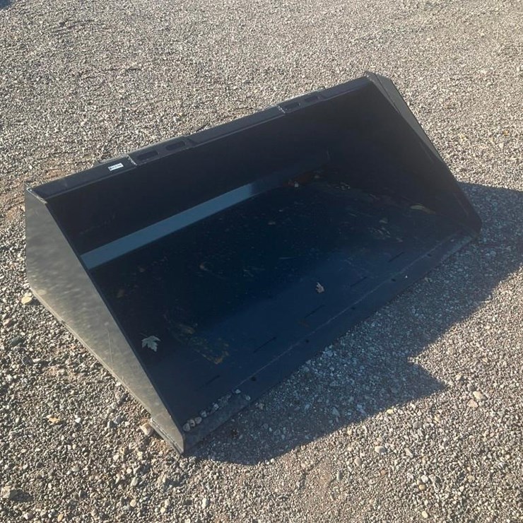 #1170 • Unused Wolverine Skid Steer Track Duty Bucket Attachment