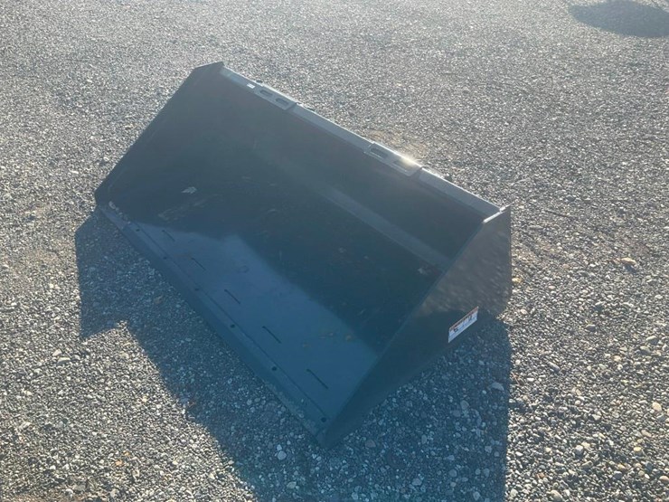 #1169-•-unused-wolverine-skid-steer-track-duty-bucket-attachment-image-2