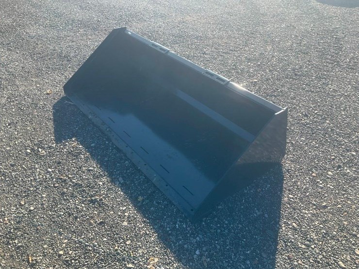 #1173-•-unused-wolverine-skid-steer-track-duty-bucket-attachment-image-2