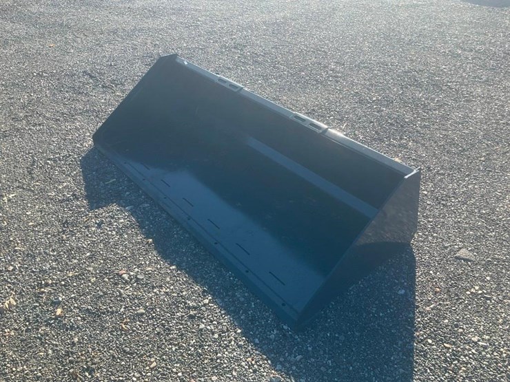 #1175-•-unused-wolverine-skid-steer-track-duty-bucket-attachment-image-2