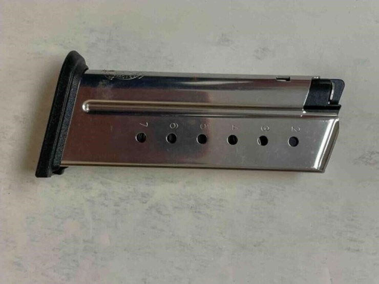 box-of-holsters,-misc.-magazines-image-24