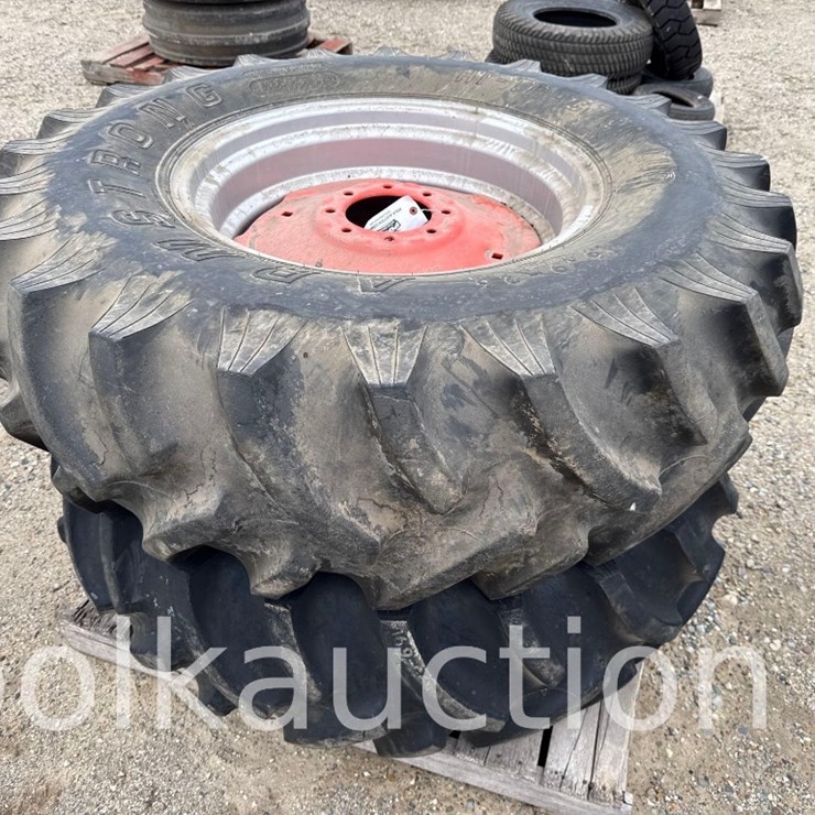 2229 - (2) 16.9-26 FIRESTONE TIRES ON CASE RIMS - FROM THE LARRY POLK ESTATE