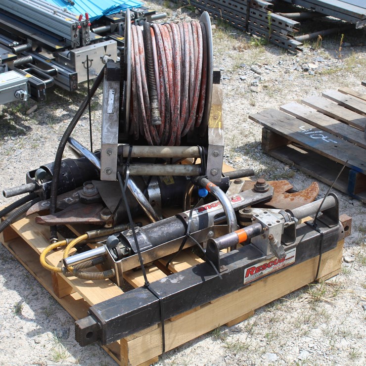 #8009 • (3) JAWS OF LIFE AND (1) PORTABLE RAM AND (1) POWER RETRACT HOSE SET