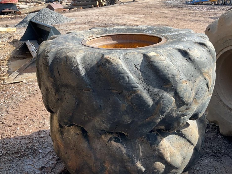 #341-•-skidder-rims-with-tires-image-3