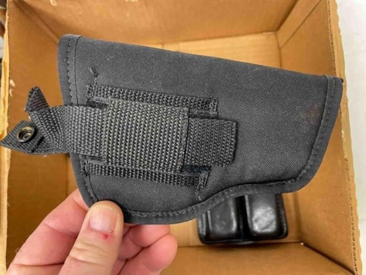 box-of-holsters,-misc.-magazines-image-3