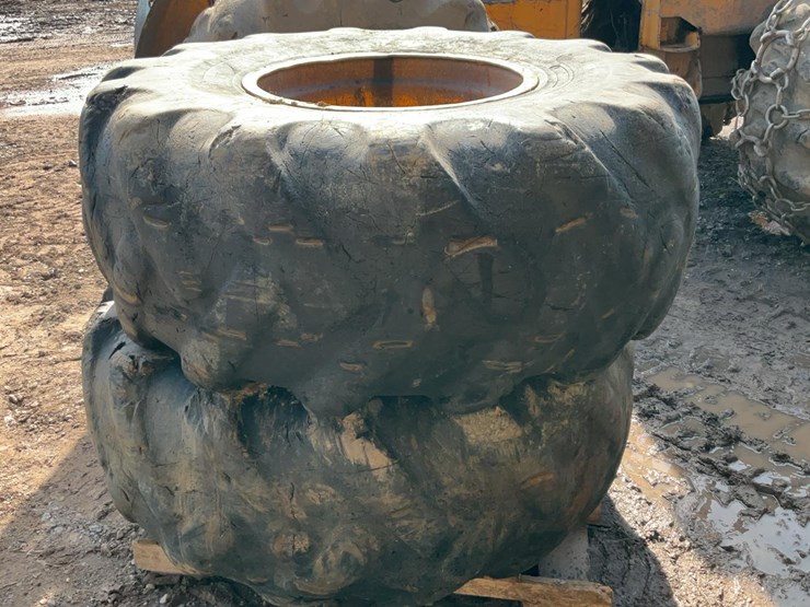 #341-•-skidder-rims-with-tires-image-1