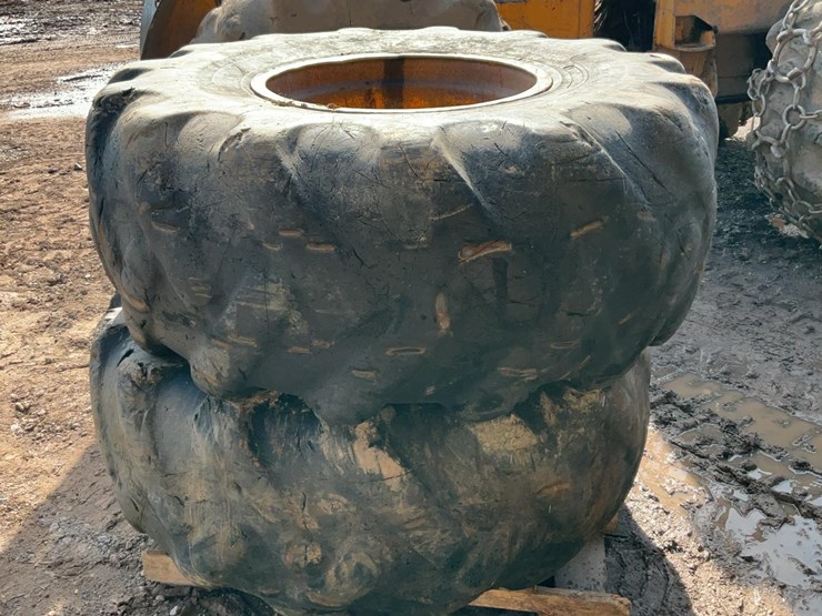 #341-•-skidder-rims-with-tires-image-2