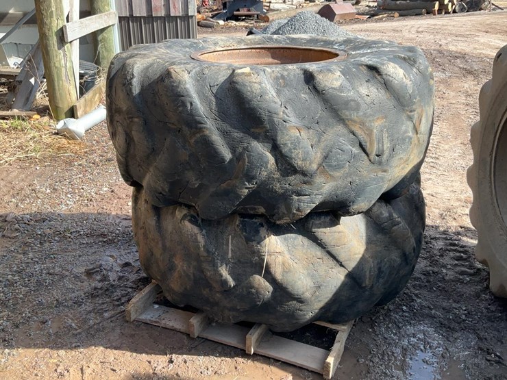 #341-•-skidder-rims-with-tires-image-4