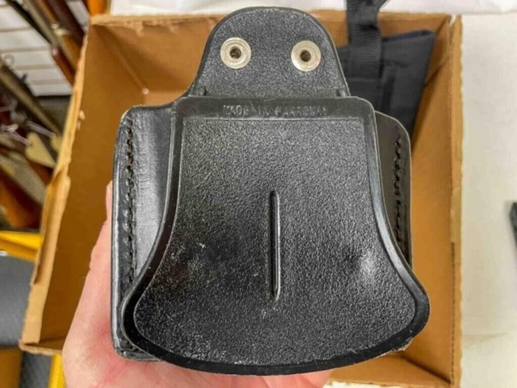 box-of-holsters,-misc.-magazines-image-2