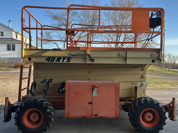 #106-•-1994-jlg-rough-terrain-scissor-lift-image-1