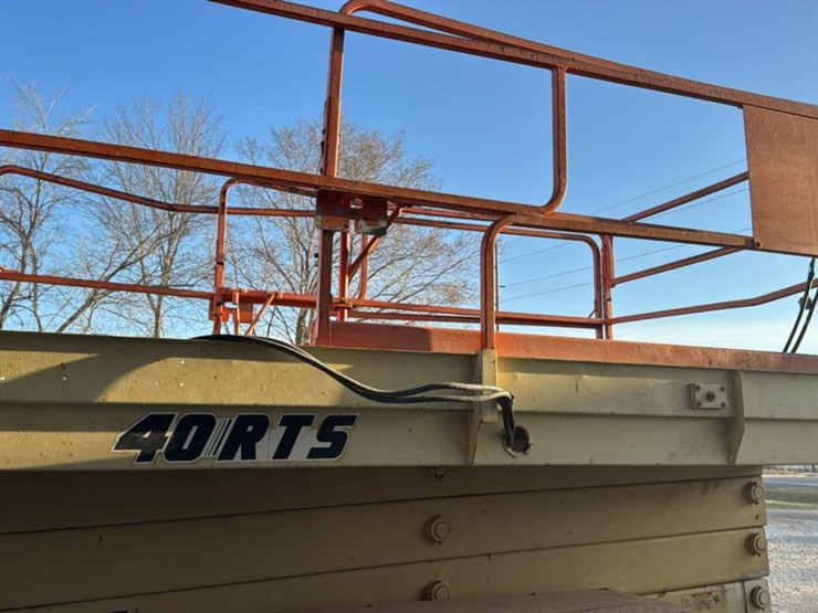 #106-•-1994-jlg-rough-terrain-scissor-lift-image-12