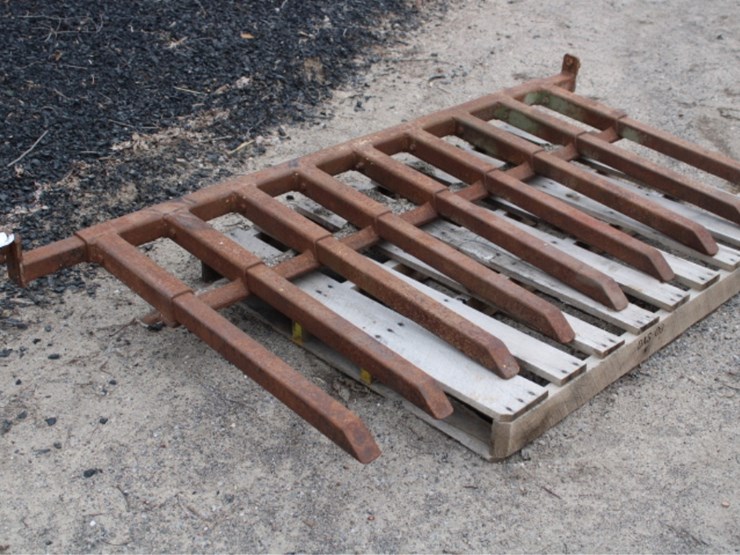 #7718-•-universal-stone-forks-for-bucket-image-1