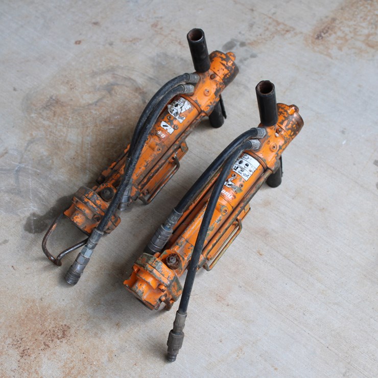 #1032 • (2) Skidril Hydaulic Rotary Drill - Mini Excavator/Skid Steer Attachment