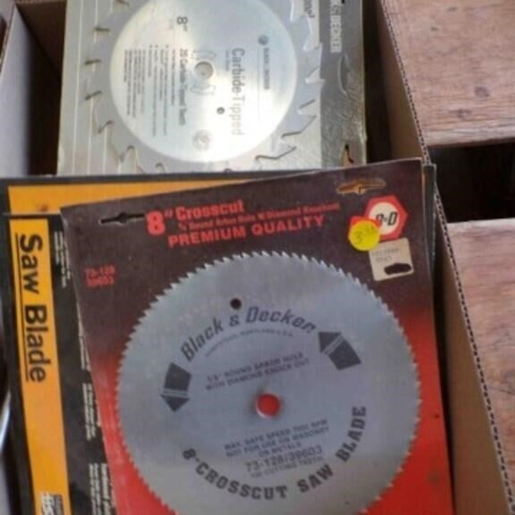 Box of drill bits, saw blades, etc.