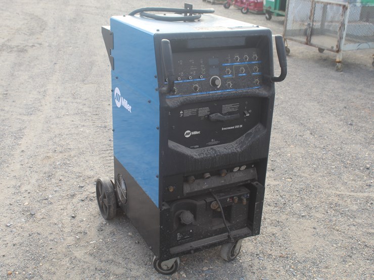 #8047-•-miller-sycrowave-dx-welding-machiine-image-1
