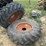 #37297-•-lot-of-(2)-14.9-24-tractor-tires-image-1