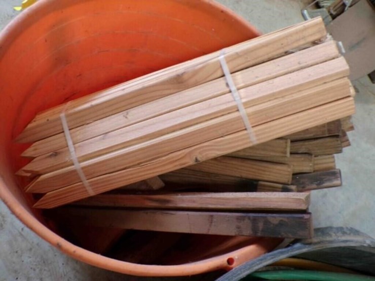 2--tubs-of-wood-stakes-&-garden-hose-image-2