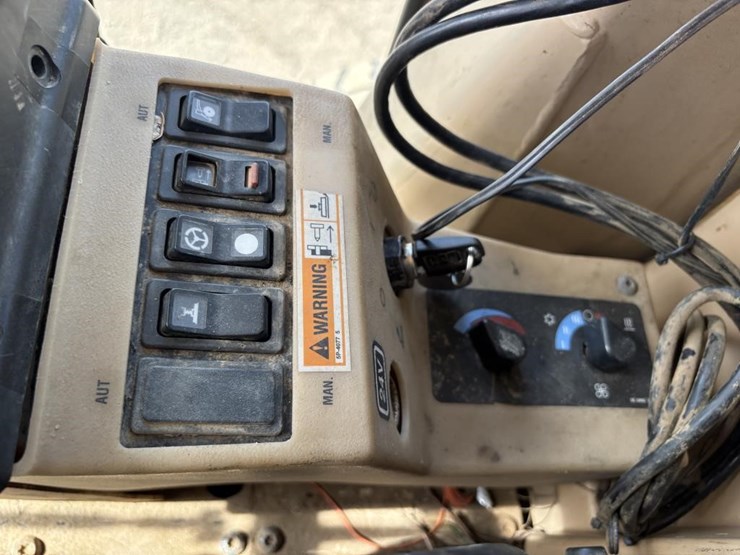 2006-caterpillar-143h-image-52