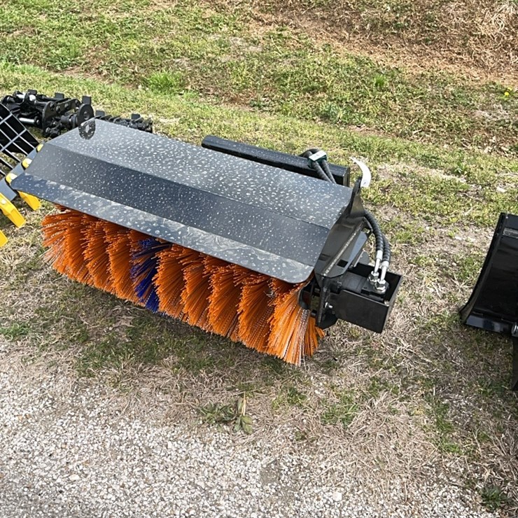 mini skid steer sweaper