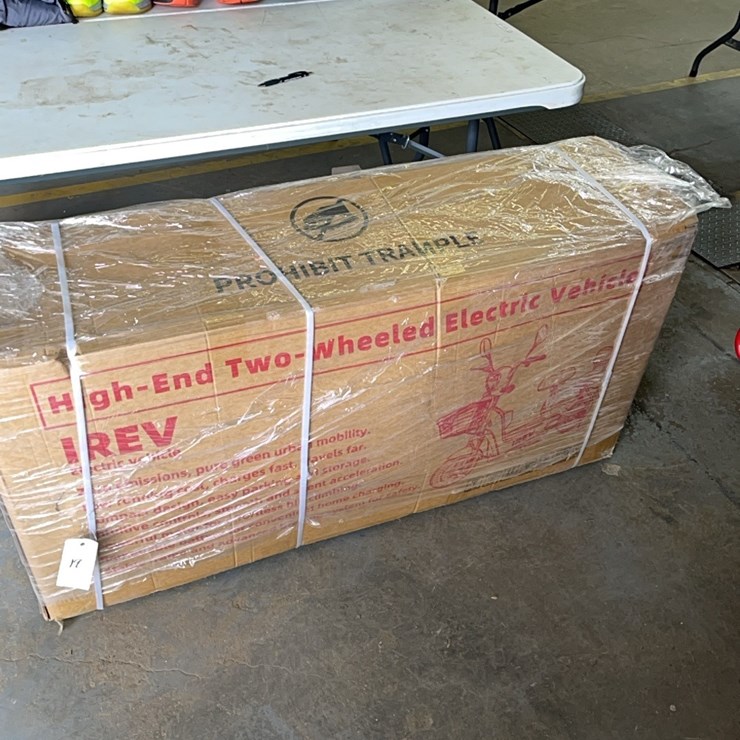 Irev two wheeled electric scooter in box