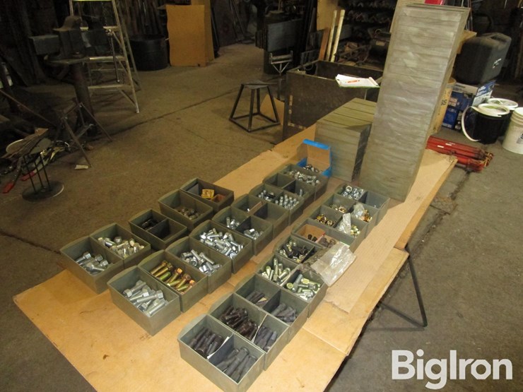 large-assortment-of-wheel-studs,-lug-bolts,-lug-nuts,-and-washers-image-7