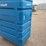 large-blue-polyethylene-laundry-cart-with-metal-shelves-on-casters-image-5