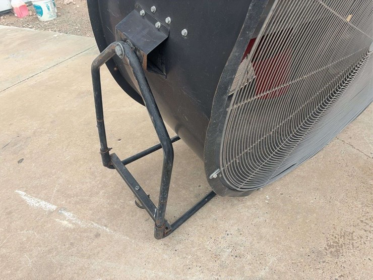 large-industrial-floor-fan-with-metal-frame-and-red-blades-image-8