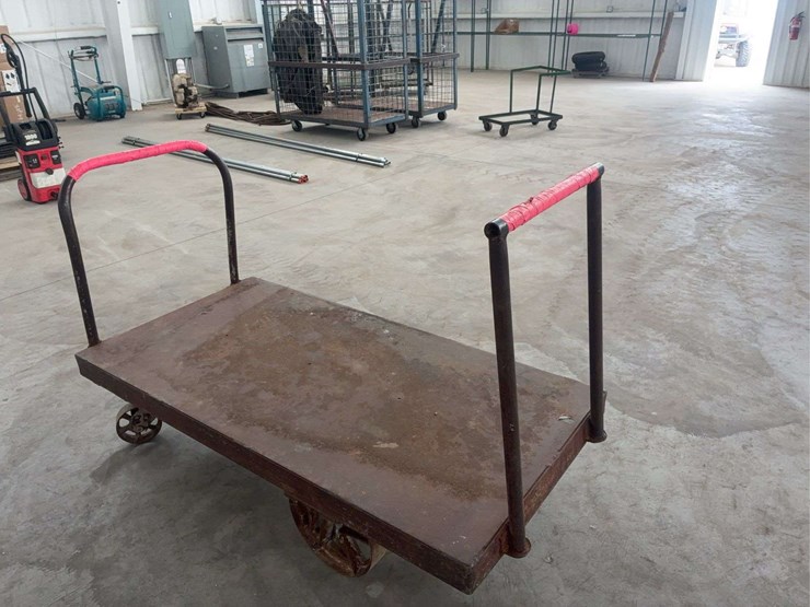 heavy-duty-steel-platform-cart-with-dual-handles-and-cast-iron-wheels-image-2