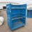 large-blue-polyethylene-laundry-cart-with-metal-shelves-on-casters-image-1