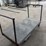 heavy-duty-steel-platform-cart-with-dual-handles-and-four-wheels-image-2