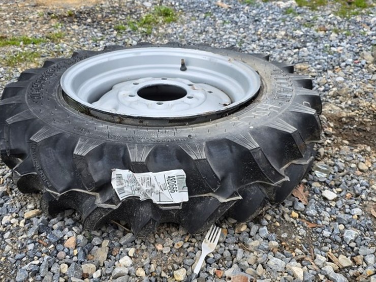 new-1-titan-7-16-tire-&-rim-image-1