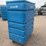blue-polyethylene-rolling-laundry-cart-with-metal-shelves-image-3