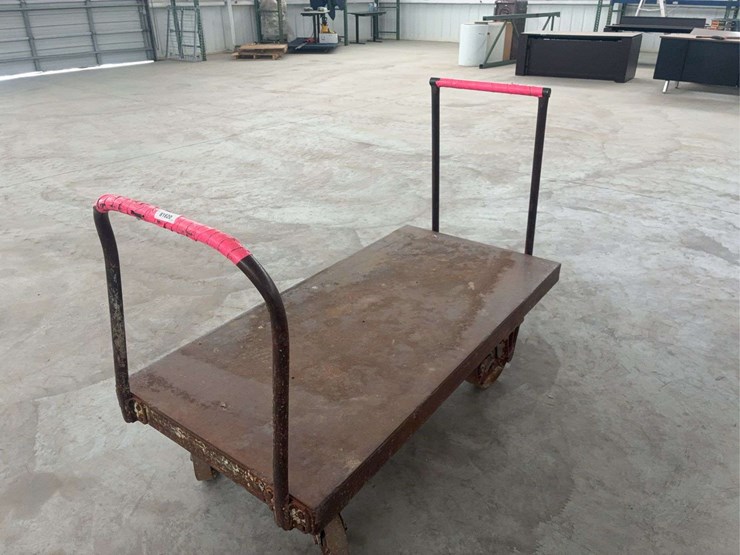 heavy-duty-steel-platform-cart-with-dual-handles-and-cast-iron-wheels-image-4