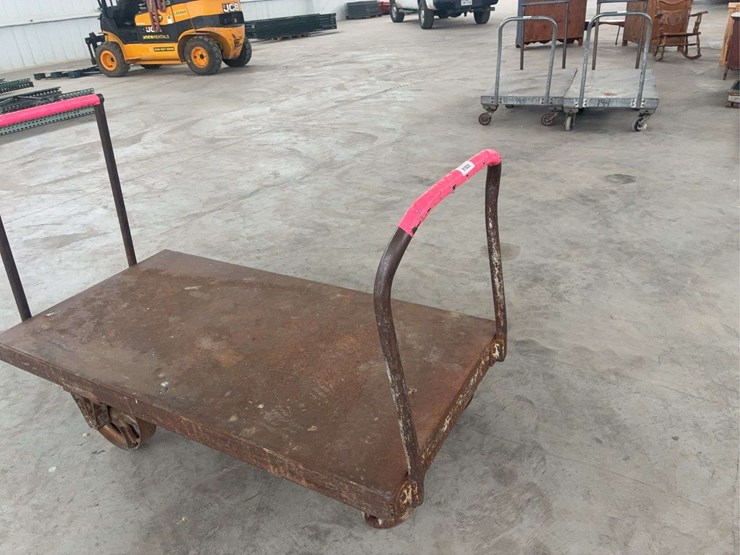 heavy-duty-steel-platform-cart-with-dual-handles-and-cast-iron-wheels-image-5
