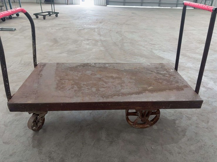 heavy-duty-steel-platform-cart-with-dual-handles-and-cast-iron-wheels-image-3