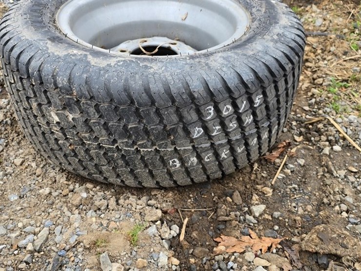 new-1-titan-27x10.50-tire-&-rim-image-1