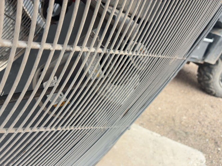 large-industrial-floor-fan-with-metal-frame-and-red-blades-image-6